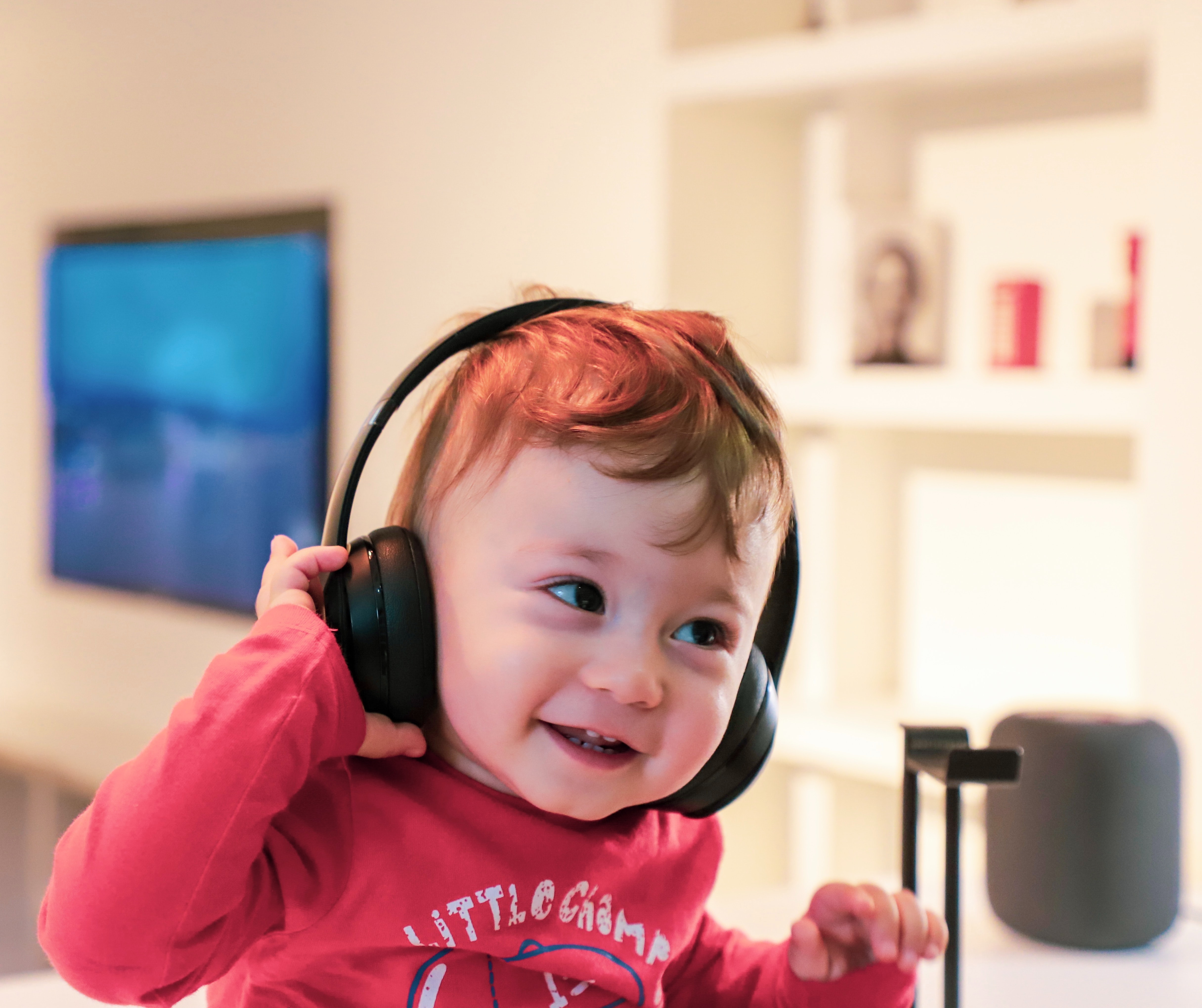 Child listening to Music on headphones. 