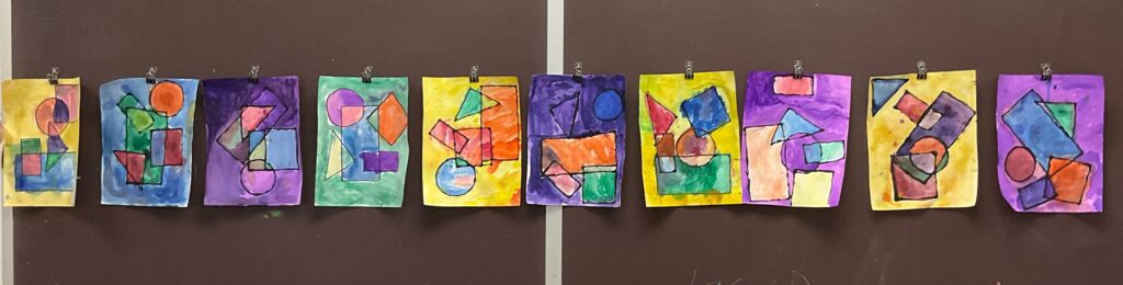 Traced shapes with each section a different color of watercolor paint.  Simple Activities for Preschoolers.